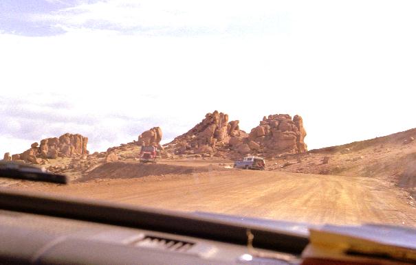 Cars on road near top.